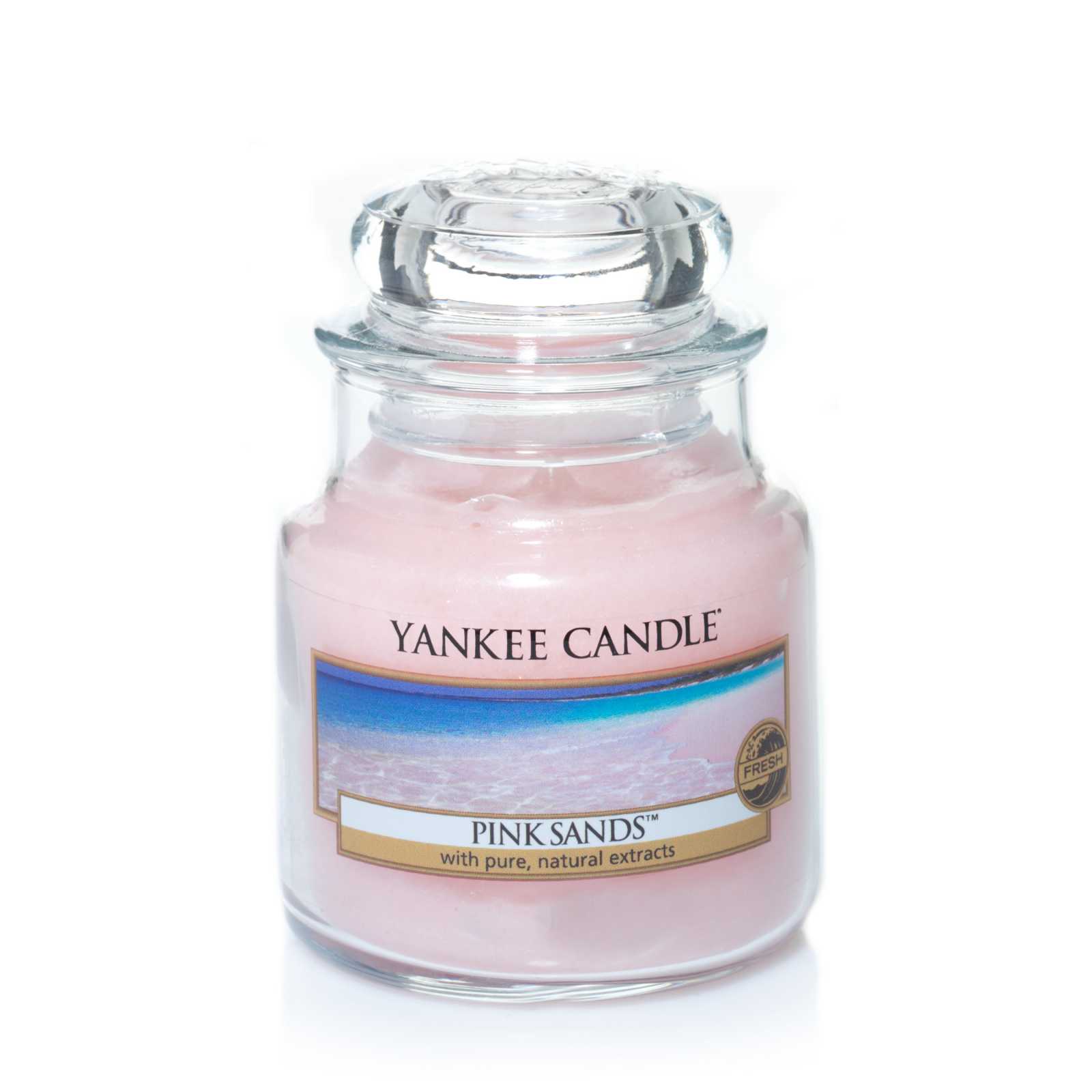 product image - Класична свічка в середній банці Yankee Candle PINK SANDS, з квітковим ароматом, бежевий